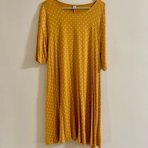 Yellow dress with white polka dots